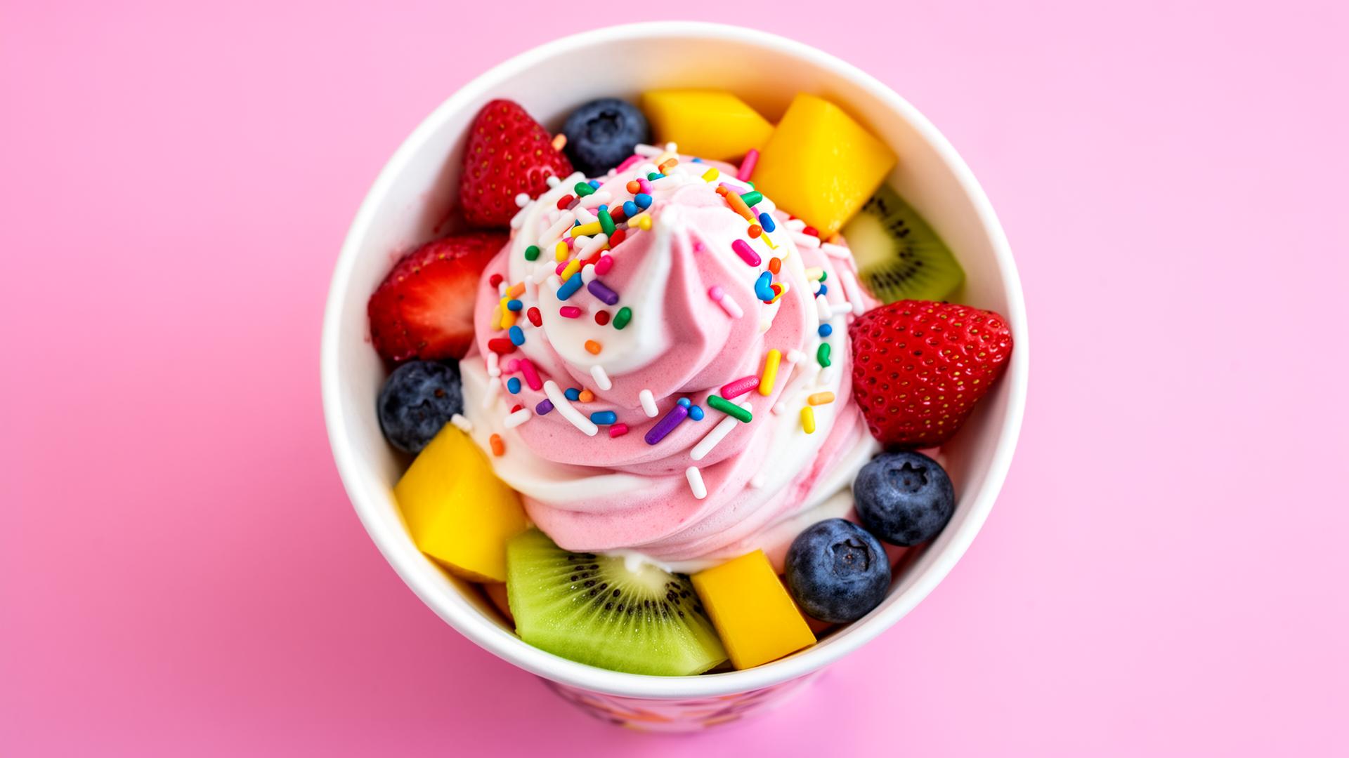 Strawberry frozen yogurt with fresh fruit toppings